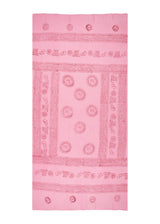 Wide enough to lie on. The Blossom Om Sarong from The Bloom Set, light pink, spread out.