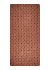 Made by hand, no two quite alike. The Wood Aura Sarong from The Terracotta Set, clay brown, spread out.